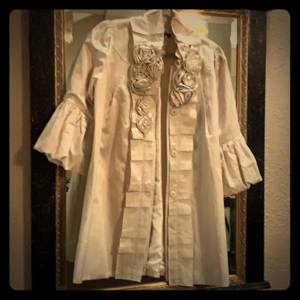 Cream colored mid length jacket